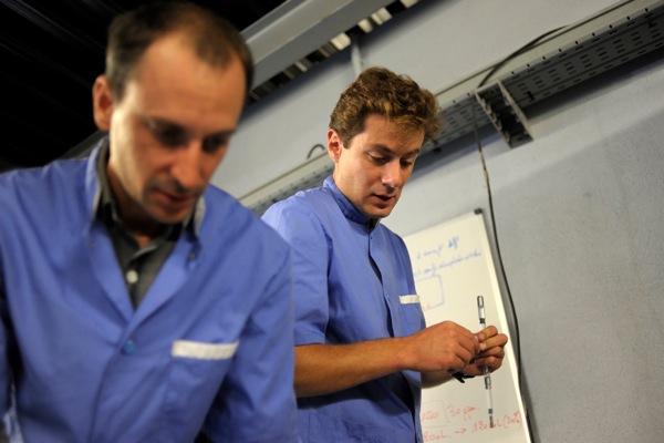 Two Vetofish aquatic veterinarians in professional clothing